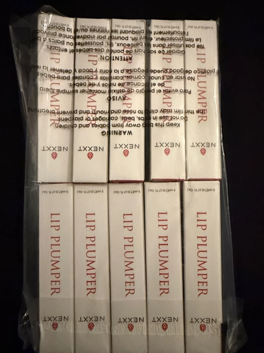 Nexxt Lip Plumper - White & Red Retail Boxes-2 for $25